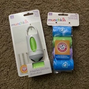 Munchkin change & toss diaper dispenser and refill bags. Brand new in package